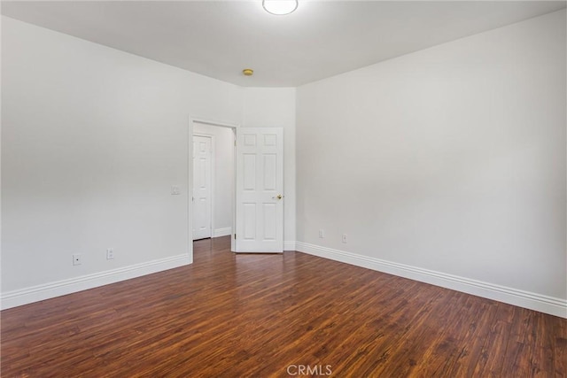 34879 Olive Tree Ln, Yucaipa, CA 92399 - empty room featuring baseboards and wood finished floors