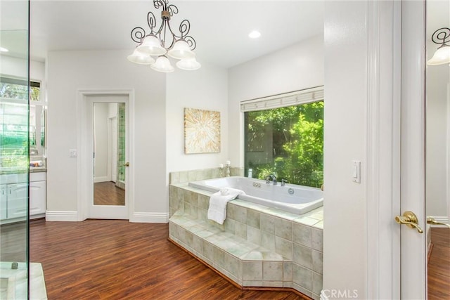 34879 Olive Tree Ln, Yucaipa, CA 92399 - full bath with a garden tub, wood finished floors, a chandelier, baseboards, and recessed lighting