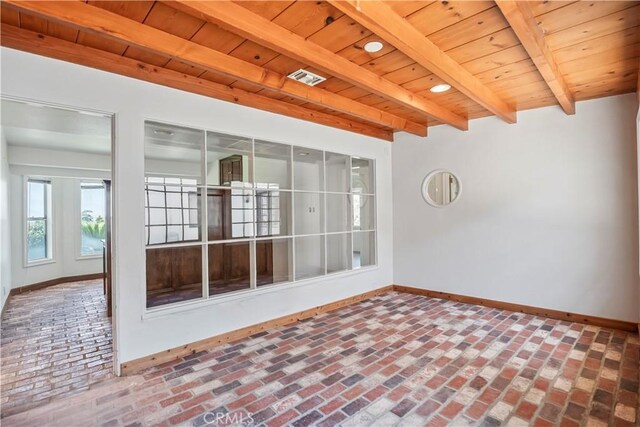 7008 Hawarden Dr, Riverside, CA 92506 - unfurnished sunroom with beam ceiling