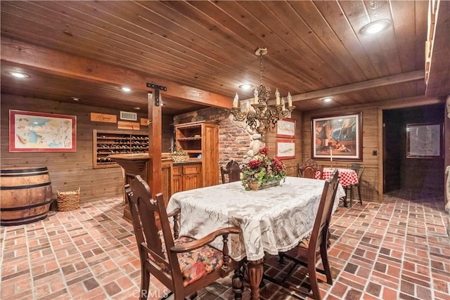 7008 Hawarden Dr, Riverside, CA 92506 - dining room with wood ceiling, wood walls, brick flooring, recessed lighting, and a chandelier