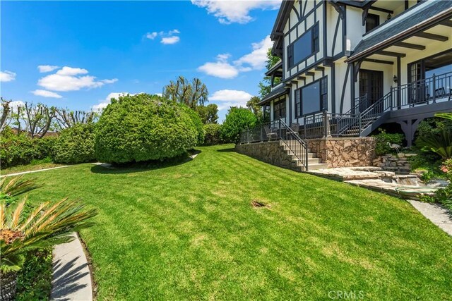 7008 Hawarden Dr, Riverside, CA 92506 - view of grassy yard featuring stairs