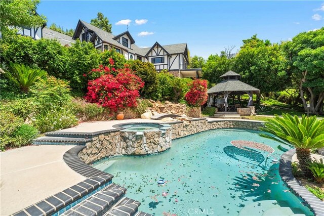 7008 Hawarden Dr, Riverside, CA 92506 - view of pool featuring a gazebo and a pool with connected hot tub