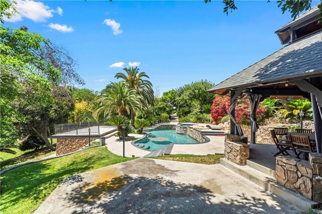 7008 Hawarden Dr, Riverside, CA 92506 - view of pool with a gazebo, a patio area, and a pool with connected hot tub