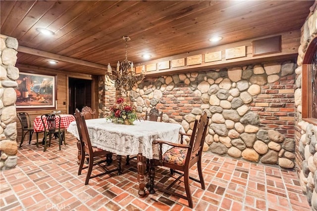 7008 Hawarden Dr, Riverside, CA 92506 - dining space with a chandelier, wooden ceiling, recessed lighting, and brick flooring