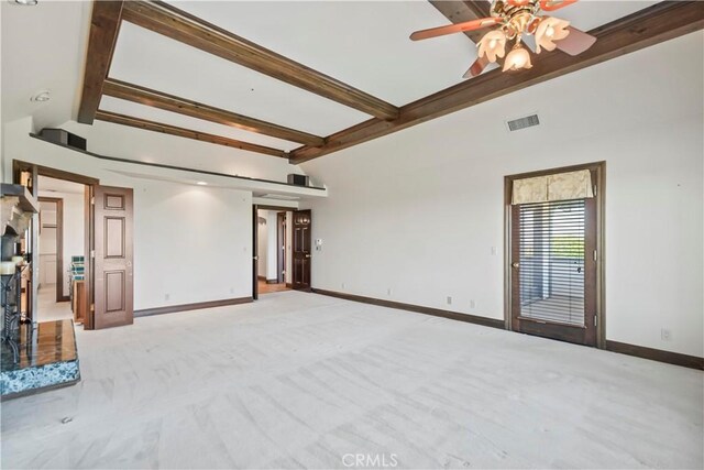 7008 Hawarden Dr, Riverside, CA 92506 - unfurnished living room featuring carpet flooring, baseboards, and ceiling fan