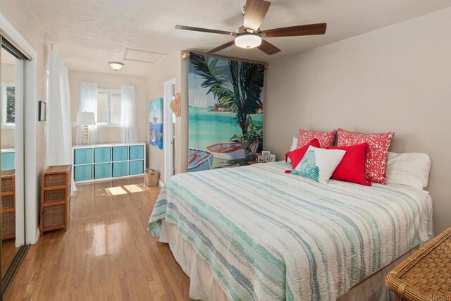 1855 Rubenstein Dr, Cardiff By The Sea, CA 92007 - bedroom featuring wood finished floors, a ceiling fan, and attic access