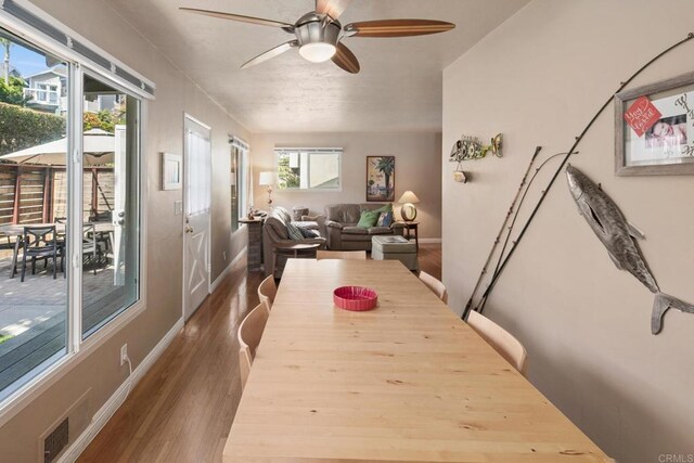 1855 Rubenstein Dr, Cardiff By The Sea, CA 92007 - dining space featuring ceiling fan, wood finished floors, and baseboards