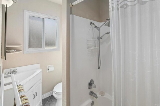 1855 Rubenstein Dr, Cardiff By The Sea, CA 92007 - full bath featuring vanity, shower / bath combination with curtain, toilet, and baseboards