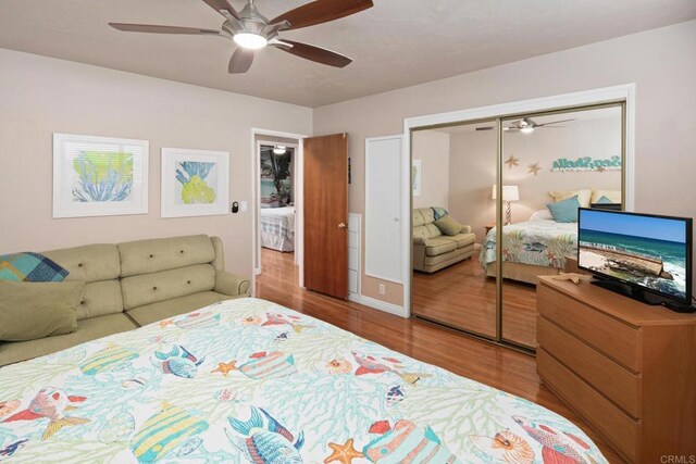 1855 Rubenstein Dr, Cardiff By The Sea, CA 92007 - bedroom featuring wood finished floors, a closet, and a ceiling fan