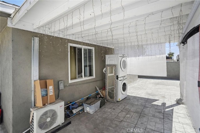 1109 S Dacotah St, Los Angeles, CA 90023 - view of patio / terrace featuring stacked washing machine and dryer and ac unit