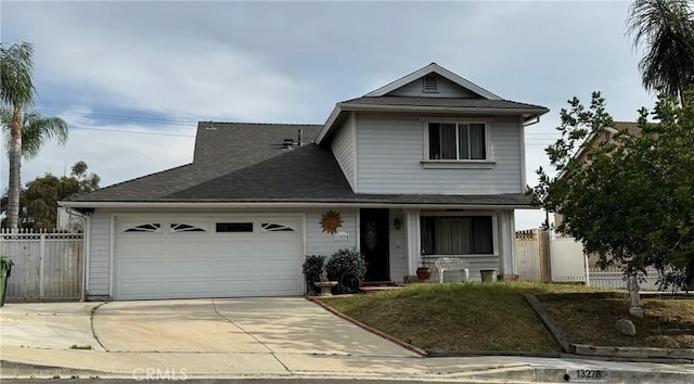 13278 Parkland Cir, Sylmar, CA 91342 - traditional home featuring an attached garage, driveway, and a shingled roof