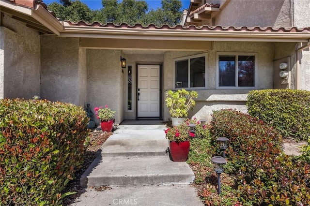 1334 Tourney Hill Ln Unit 61, Nipomo, CA 93444 - doorway to property with stucco siding