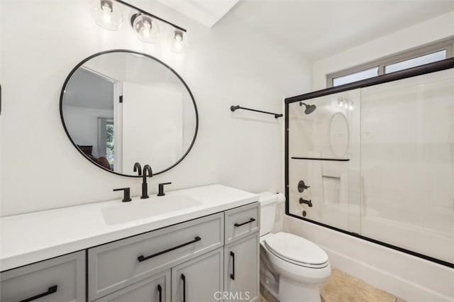 1334 Tourney Hill Ln Unit 61, Nipomo, CA 93444 - bathroom with vanity, toilet, and bath / shower combo with glass door
