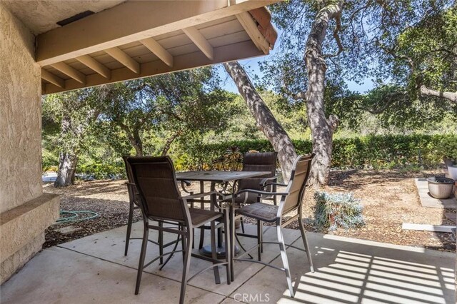 1334 Tourney Hill Ln Unit 61, Nipomo, CA 93444 - view of patio featuring outdoor dining area