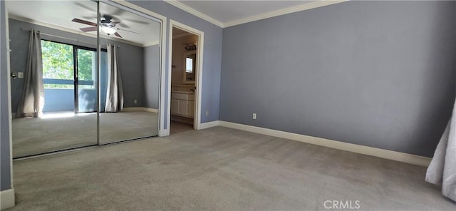 623 Church Pl Unit 3, Redlands, CA 92374 - unfurnished bedroom with crown molding, carpet flooring, baseboards, access to outside, and ensuite bathroom