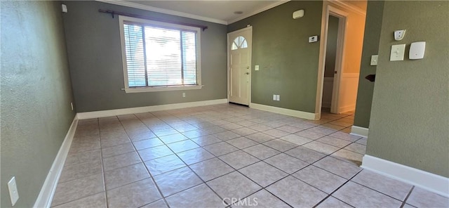 623 Church Pl Unit 3, Redlands, CA 92374 - unfurnished room with crown molding, light tile patterned floors, baseboards, and a textured wall