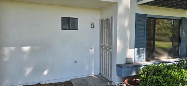 623 Church Pl Unit 3, Redlands, CA 92374 - doorway to property with stucco siding