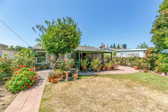 14719 Wyandotte St, Van Nuys, CA 91405 - back of house with a yard and a patio