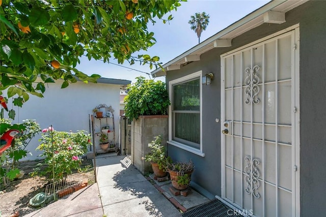 14719 Wyandotte St, Van Nuys, CA 91405 - entrance to property with stucco siding and a patio