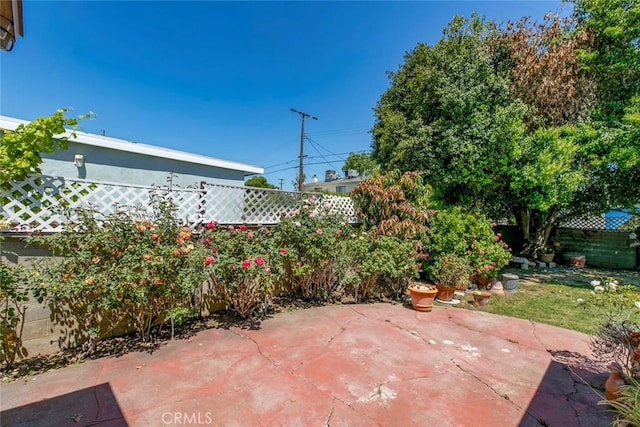 14719 Wyandotte St, Van Nuys, CA 91405 - fenced backyard with a patio area