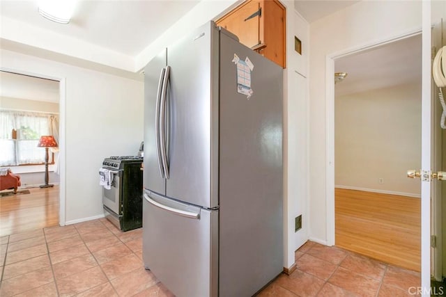 14719 Wyandotte St, Van Nuys, CA 91405 - kitchen featuring stainless steel appliances and baseboards