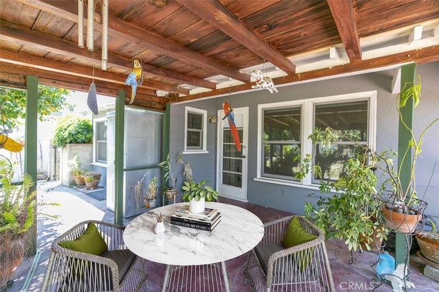 14719 Wyandotte St, Van Nuys, CA 91405 - sunroom featuring beam ceiling and healthy amount of natural light