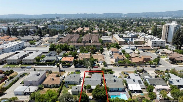 14719 Wyandotte St, Van Nuys, CA 91405 - view of property location with property boundaries highlighted and a mountainous background