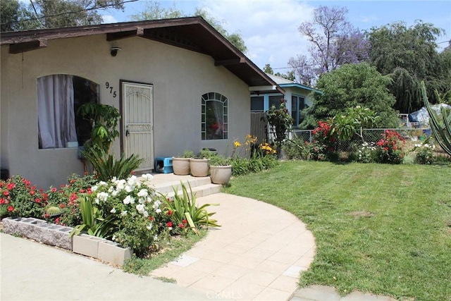 975 E Citrus St, Riverside, CA 92507 - view of side of home featuring stucco siding