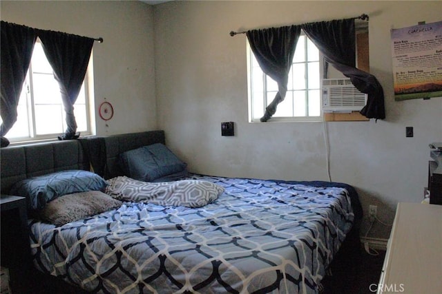 975 E Citrus St, Riverside, CA 92507 - bedroom featuring multiple windows and cooling unit