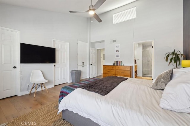 4455 Fulton Ave Unit 2, Sherman Oaks, CA 91423 - bedroom featuring wood finished floors, high vaulted ceiling, ensuite bath, and ceiling fan