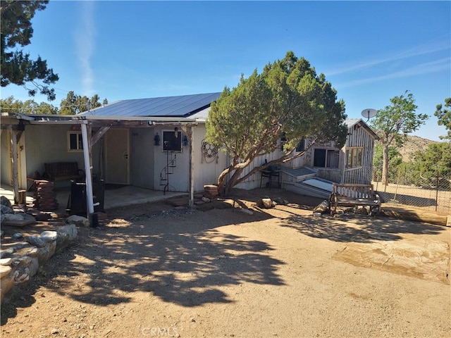 29348 123rd St E, Pearblossom, CA 93553 - back of property featuring a patio area and solar panels