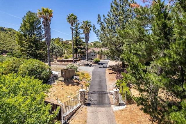 5 W 12th St, Paso Robles, CA 93446 - exterior space with a gate and asphalt driveway