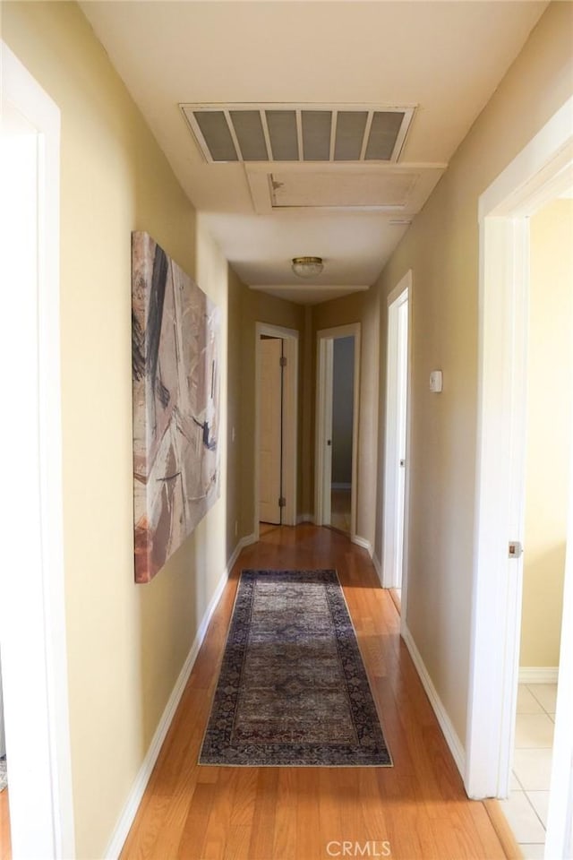 5 W 12th St, Paso Robles, CA 93446 - corridor with light wood finished floors and baseboards