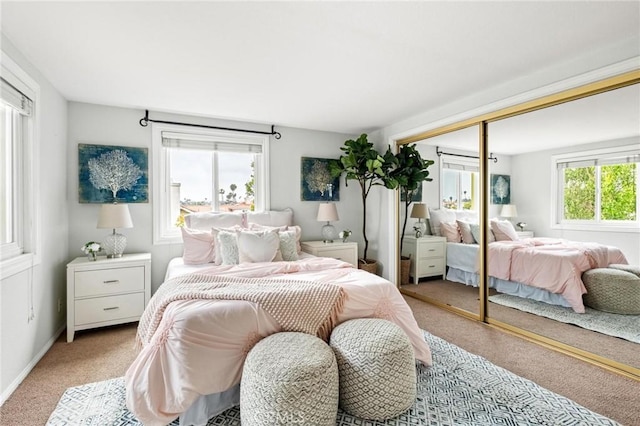 1909 Belmont Ln Unit B, Redondo Beach, CA 90278 - bedroom with light colored carpet, a closet, and baseboards