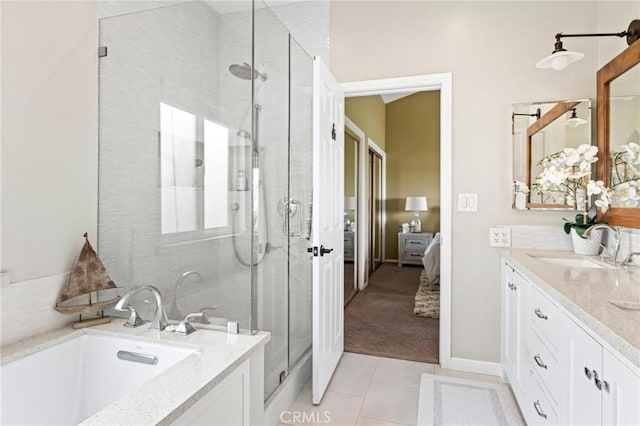 1909 Belmont Ln Unit B, Redondo Beach, CA 90278 - bathroom featuring a stall shower, a garden tub, vanity, and tile patterned floors