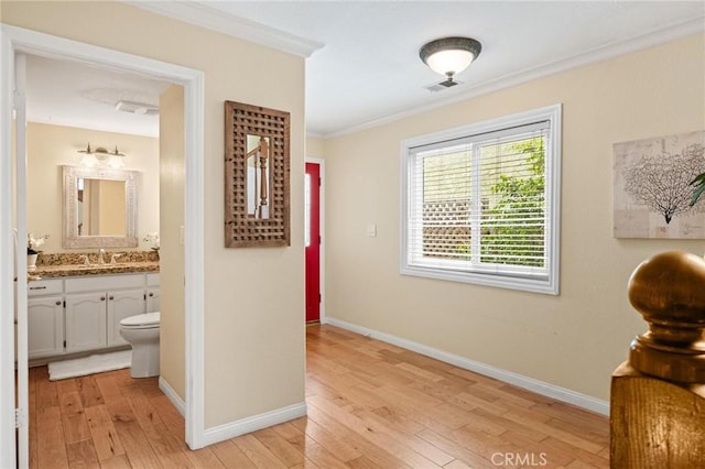 1909 Belmont Ln Unit B, Redondo Beach, CA 90278 - hall with ornamental molding, light wood-style flooring, a sink, and baseboards