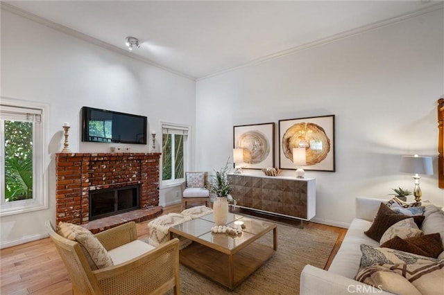 1909 Belmont Ln Unit B, Redondo Beach, CA 90278 - living room with wood finished floors, plenty of natural light, crown molding, and a brick fireplace