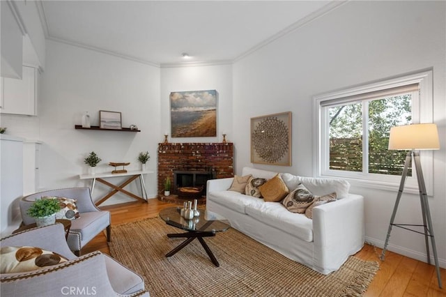 1909 Belmont Ln Unit B, Redondo Beach, CA 90278 - living room with light wood-type flooring, crown molding, and a brick fireplace