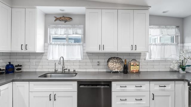 1420 E Ln, Imperial Beach, CA 91932 - kitchen featuring dishwashing machine, a sink, and dark countertops
