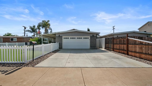 1420 E Ln, Imperial Beach, CA 91932 - view of front of property featuring a garage, a fenced front yard, and driveway