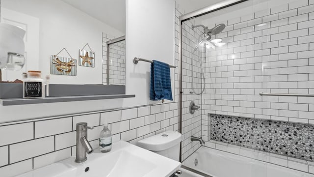 1420 E Ln, Imperial Beach, CA 91932 - bathroom featuring bath / shower combo with glass door, toilet, and a sink
