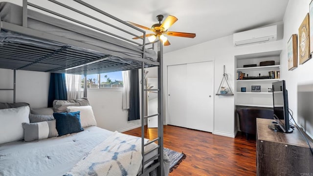 1420 E Ln, Imperial Beach, CA 91932 - bedroom featuring a wall mounted AC, wood finished floors, a closet, and ceiling fan