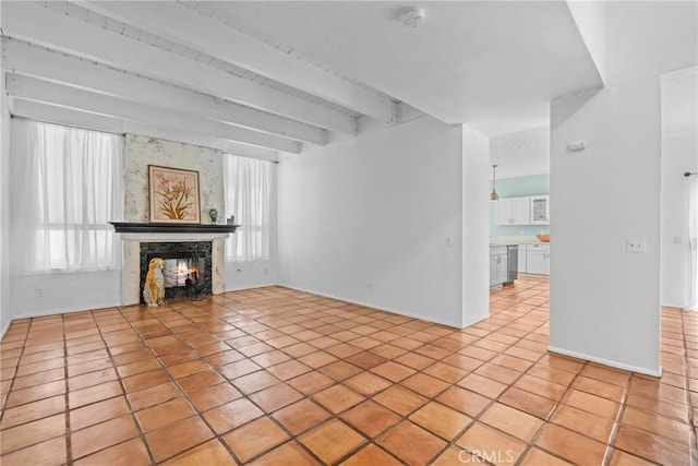 23633 Breezy Meadow Ct, Moreno Valley, CA 92557 - unfurnished living room with light tile patterned floors, a premium fireplace, and beamed ceiling