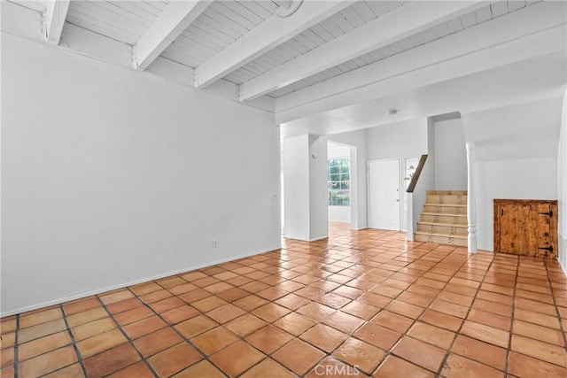 23633 Breezy Meadow Ct, Moreno Valley, CA 92557 - unfurnished living room featuring beam ceiling, stairs, tile patterned flooring, and wood ceiling