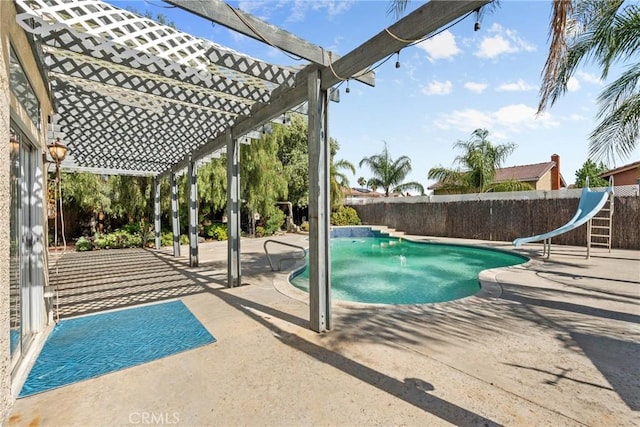 23633 Breezy Meadow Ct, Moreno Valley, CA 92557 - view of swimming pool with a water slide, a patio area, a pergola, and a fenced backyard