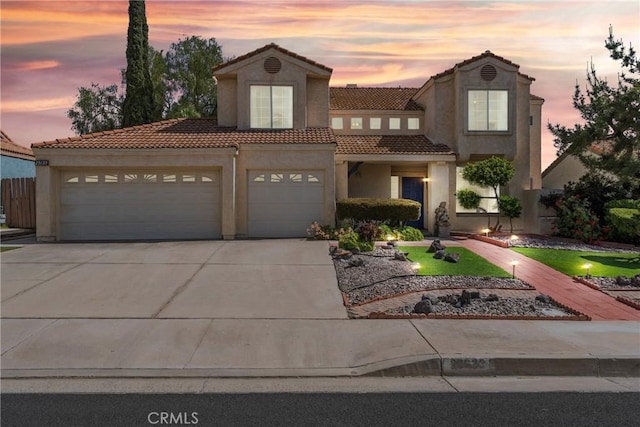 23633 Breezy Meadow Ct, Moreno Valley, CA 92557 - view of front facade featuring a tiled roof, concrete driveway, stucco siding, and a garage