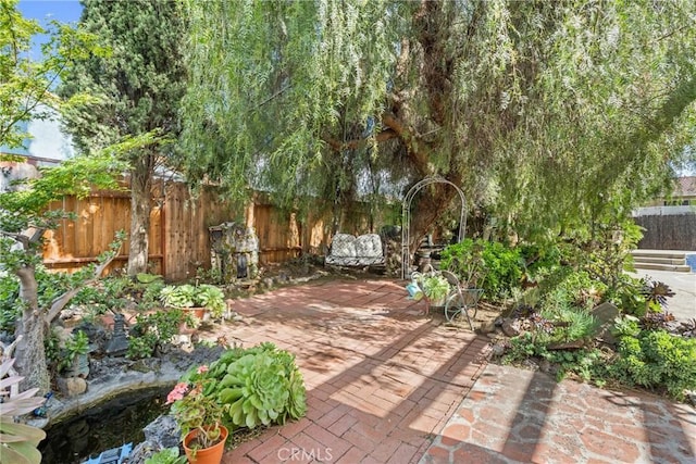 23633 Breezy Meadow Ct, Moreno Valley, CA 92557 - view of patio with fence
