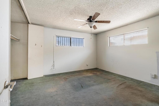 8731 Lucia Pl, Sun Valley, CA 91352 - empty room with a textured ceiling, a ceiling fan, and carpet