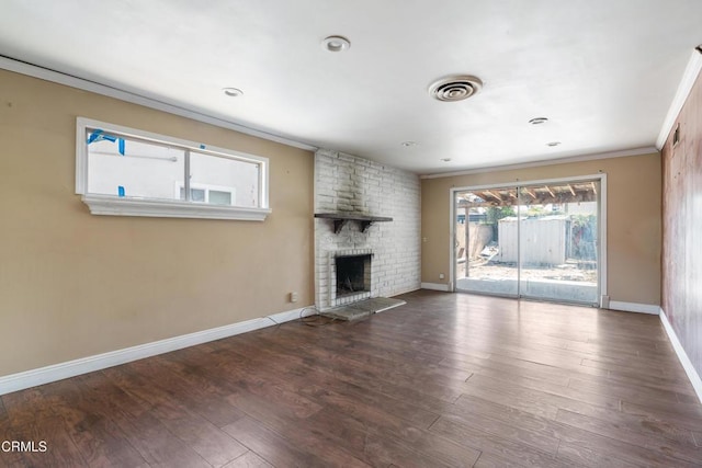 8731 Lucia Pl, Sun Valley, CA 91352 - unfurnished living room featuring crown molding, baseboards, a fireplace, and wood finished floors