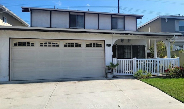 838 E Calbas St, Carson, CA 90745 - view of front facade with covered porch, stucco siding, and concrete driveway